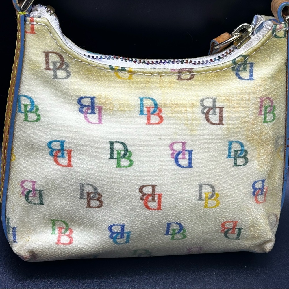 Dooney & Bourke Itsy Bitsy Ivory Multi-Color Monogram MIni Handbag. - Picture 3 of 8